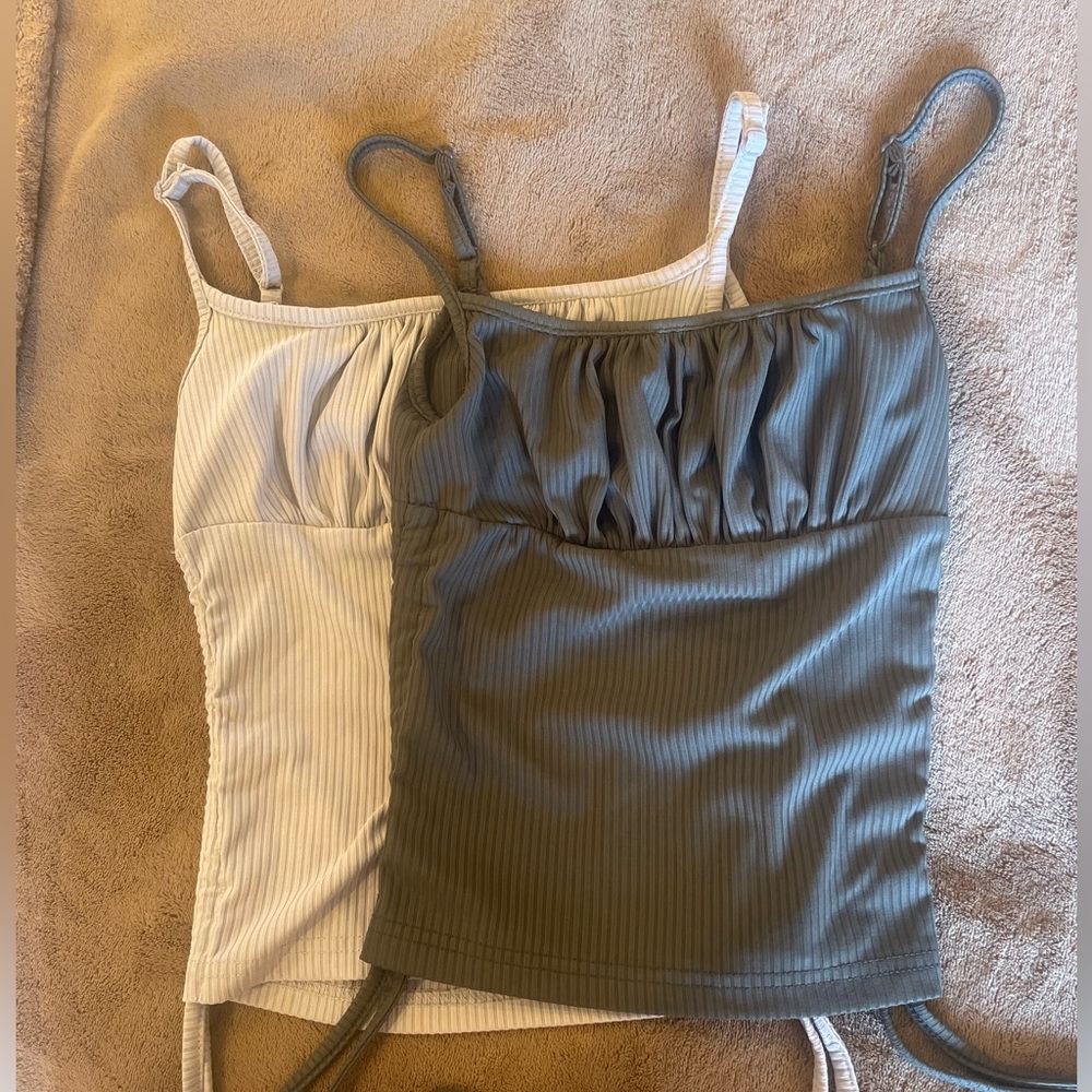 Super cute tank tops, the sides ruffle aswell